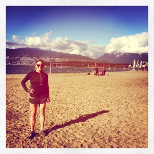 Chelsea enjoys a sunny break on Kits Beach during a run